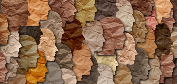 Image of multiethnic faces in paper cut outs