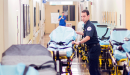 Community paramedic prepares for a patient 