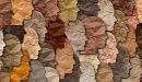 Image of multiethnic faces in paper cut outs